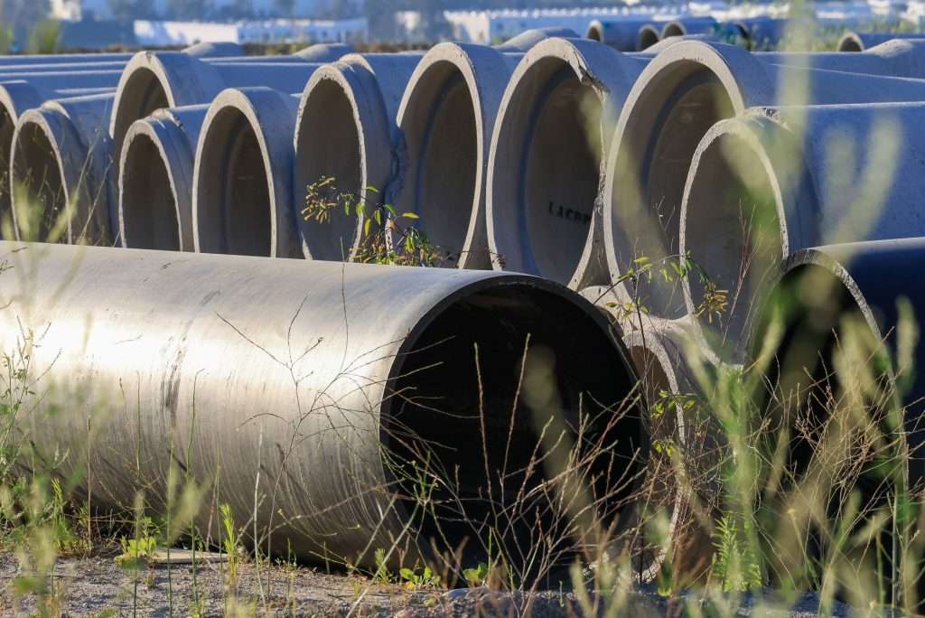 Stacked precast concrete culvert pipes