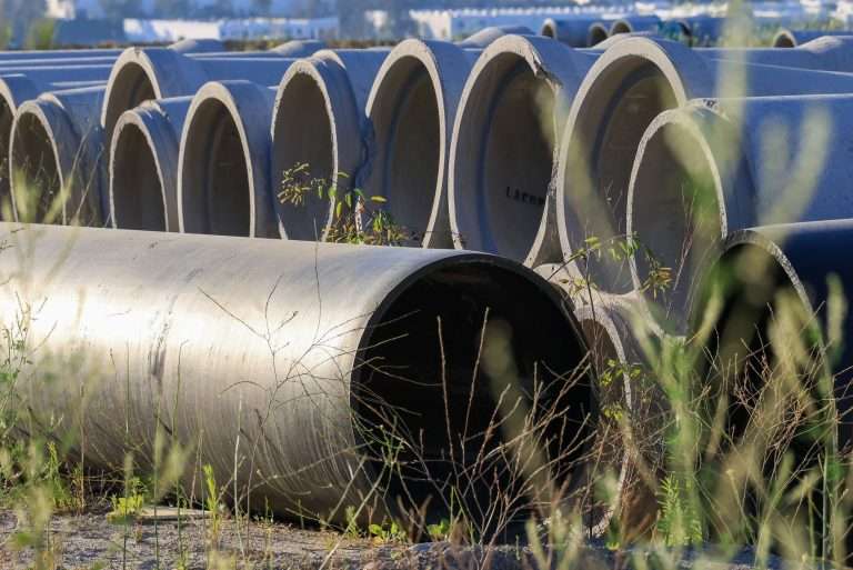 Stacked precast concrete culvert pipes