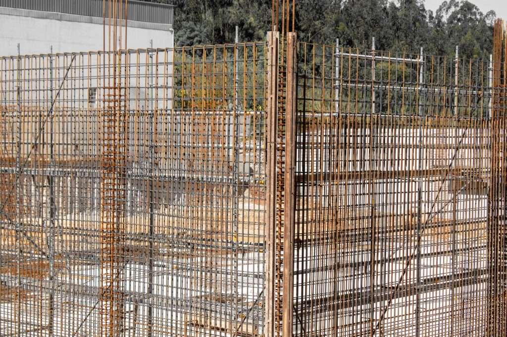 Reinforcement steel bars set inside timber formwork on site