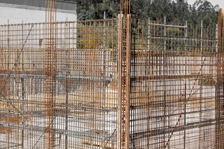 Reinforcement steel bars set inside timber formwork on site